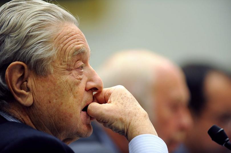 © AP Photo / Kevin Wolf Американский миллиардер Джордж Сорос